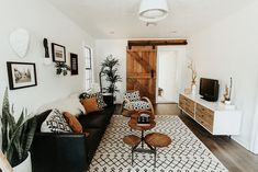 a living room filled with furniture and decor