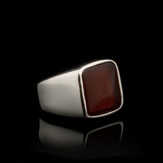 Red Agate Rectangle Silver Men Ring. Handmade in 925 sterling silver with agate stone. On the ring rectangle red agate - aqeeq stone settled. Small and elegant. Dimensions of stone is 13 mm x 11 mm. Average weight of Red Agate Rectangle Silver Men Ring is 6 gr. (depends your ring size). Back side of the stone open to touch your skin. Stone Type: Agate - Aqeeq Stone Color: Red Stone Dimensions: 13 mm x 11 mm Stone Shape: Rectangle, Flat Average Weight: 6 gr. Made in Istanbul, Turkey. Need 3-6 day Rectangular Red Signet Ring For Gift, Red Rectangular Signet Ring For Gift, Red Rectangular Ring With Polished Finish, Red Rectangular Rings With Polished Finish, Luxury Silver Men's Ring With Rectangular Stone, Rectangular Red Rings With Polished Finish, Red Stone Ring For Men, Luxury Red Gemstone Men's Ring, Men Ring Silver