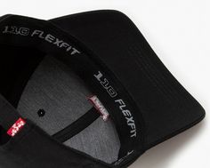 Your favorite everyday baseball cap. We designed our Flexfit® Housemark Logo Cap with a timeless fit, an adjustable strap and topped it off with our signature logo. An everyday baseball cap With an adjustable strap Finished with our signature logo Functional Adjustable Snapback Hat With Curved Visor, Sporty Adjustable Baseball Cap With Logo, Sporty Adjustable Logo Baseball Cap, Functional Adjustable Baseball Cap, Black Six-panel Snapback Hat With Custom Logo, Adjustable Six-panel Baseball Cap With Custom Logo, Black Levis, Signature Logo, Baseball Cap