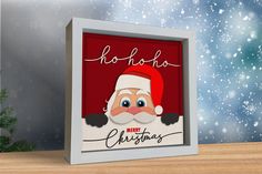 a christmas card with a santa clause on it and snowflakes in the background