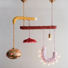 an assortment of ornaments hanging from the ceiling