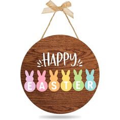 a wooden sign that says happy easter with three colorful bunnies hanging from the front