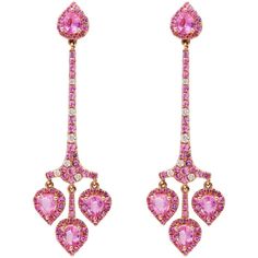 Indulge your inner empress with the stunning Empress Earrings from Ruchi New York. These gorgeous earrings are designed to make a bold and feminine statement, featuring a mesmerizing blend of colorful pink sapphires and dazzling diamonds. With 2.76 carats of pink sapphire, 2.07 carats of pink sapphire pave, and 0.20 carats of diamonds, these earrings are sure to turn heads and make you stand out from the crowd. Crafted with care and attention to detail, these earrings are perfect for the woman w Luxury Pink Diamond Earrings With Accents, Luxury Pink Sapphire Earrings For Formal Occasions, Luxury Pink Diamond Earrings, Elegant Pink Sapphire Earrings For Wedding, Luxury Pink Sapphire Earrings, Pink Sapphire Earrings For Wedding, Fine Jewelry Pink Sapphire Earrings, Pink Diamond Drop Earrings Fine Jewelry, Luxury Pink Drop Earrings