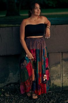 This Patchwork Maxi Skirt features an elastic, stretchy waistband, making it a comfortable and versatile piece for transitional seasons and travel. The unique pattern adds an element of exclusivity to the already sophisticated design. There may be variations among skirts since the fabrics are all different patchworks. Casual Boho Print Long Skirt, Bohemian Stretch Skirt For Vacation, Stretch Bohemian Skirt, Multicolor Stretch Tiered Skirt, Casual Relaxed Maxi Skirt For Festival, Casual Relaxed Fit Maxi Skirt For Festival, Multicolor Relaxed Skirt With Elastic Waistband, Hippie Style Gathered Skirt Bottoms, Multicolor Relaxed Fit Skirt With Elastic Waistband