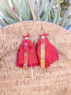 Red  Sari Silk Earrings (new silk material) with Italian Ribbon.   Would look gorgeous on any occasion or especially around the holidays. Raw brass rings and ear wires. Measure 4 inches from ear wires.