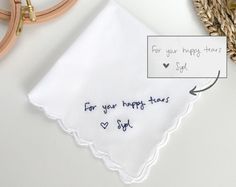 a white handkerchief with the words for your happy mother on it