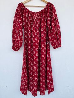 "Cotton maxi, hand block print dress, red printed dress, boho dress, boho maxi, long maxi, cotton maxi dress, gathering neck dresses, cotton dresses, vintage gown, floral maxi, hippie dresses, gauze maxi, gift for her, gift for mom, Christmas gift, festival wear, festival gift, fast shipping, red dress, indian dresses, indian cotton maxi, custom dresses option available  Feel beautiful and confident throughout your days wearing our block printed outfits, made with high quality soft and breathable cotton fabric.  The print on the dress is known as \"BLOCK PRINT\" which is centuries old technique of Indian textile carried out  by local artisans of Jaipur (INDIA) MEASUREMENTS (in inches): Size XXS-: Bust- 34″ | Shoulder- 13.5″ | Length- 51″ Size XS-: Bust- 36″ | Shoulder- 14″ | Length- 51″ Si Red Dress Indian, Red Printed Dress, Printed Outfits, Gown Floral, Block Print Dress, Dresses Cotton, Gift For Mom Christmas, Floral Cotton Dress, Cotton Long Dress