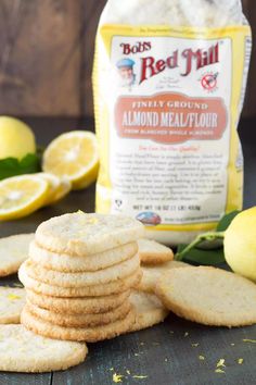 lemon shortbread cookies stacked on top of each other next to a bag of red mill flour