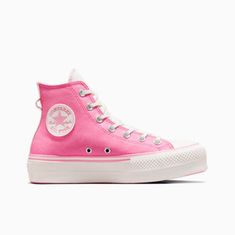 Elevate your sneaker game with these women's Converse Chuck Taylor All Star Platform shoes in Oops Pink. The high-top sneaker features a retro design with a 1.5-inch lift platform and standard shoe width. The pink colorway adds a fun pop of color that's perfect for any casual outfit. This shoe is part of the Converse Chuck Taylor All Star Platform product line and is brand new with the box. It's available in women's size 6.5 and customized options are not available. Get ready to step up your sty High-top Skate Shoes For Sports, Trendy Pink Platform Sneakers With Rubber Sole, Pink Platform Lace-up Sneakers, Pink Basketball Shoes With Gum Sole For Streetwear, Trendy Pink Platform Sneakers With Vulcanized Sole, High-top Platform Skate Shoes For Sports, Pink Wedge Sneakers With Round Toe Platform, Sporty Pink Sneakers With Thick Bottom, Trendy Pink Platform Wedge Sneakers