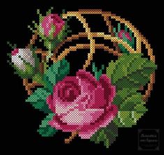 a cross stitch pattern with pink roses and green leaves in the center on a black background