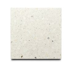 a white marble tile with speckles on it