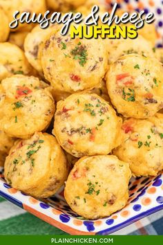 sausage and cheese muffins in a bowl on a colorful tablecloth with text overlay