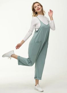 Step into effortless style with our Womens Casual Wide-Leg Jumpsuit. Crafted from a soft and breathable fabric, this jumpsuit offers a relaxed fit with its flowy wide-leg design and adjustable spaghetti straps for personalized comfort. Practical pockets provide convenience, while the gathered ankle cuffs give a modern twist. Ideal for a laid-back day or dressing up with accessories. Over 20,000+ customers have given us positive reviews Perfect for Pregnant: these stylish and comfortable jumpsuit Long Pant Jumpsuit, Stylish Jumpsuit, Baggy Style, Designer Jumpsuits, Casual Jumpsuit, Different Outfits, Sleeveless Jumpsuits, Knit Set, Cozy Knits