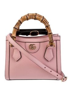 Gucci Top Handle BagPink LeatherBamboo AccentGold-Tone HardwareBamboo Handles & Single Adjustable Shoulder StrapSuede Lining & Single Interior PocketSnap Closure at TopProtective Feet at BaseIncludes Dust BagUnfortunately, due to restrictions, this item may not be eligible for shipping in all areas. Gucci Supermini Marmont Pink, Gucci Top, Gucci Mini, Handbag Handles, Saint Laurent Bag, Work Bags, Accessories Jacket, Bag Handle, Handle Bag