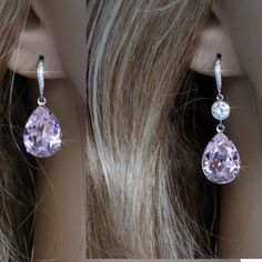 Pink Teardrop Earrings For Anniversary, Pink Sparkling Crystal Earrings For Wedding, Pink Sparkling Stones Crystal Earrings For Wedding, Pink Crystal Drop Bridal Earrings, Elegant Pink Crystal Drop Earrings, Pink Crystal Earrings With Sparkling Stones For Wedding, Pink Elegant Teardrop Earrings For Anniversary, Elegant Pink Teardrop Earrings For Anniversary, Pink Teardrop Earrings For Wedding