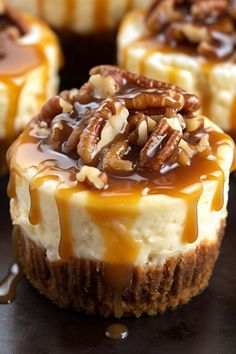 caramel cheesecakes with pecans and nuts on top