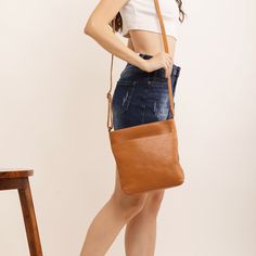 Discover our Leather Crossbody Sling Bag for Women, a Personalised Soft Leather Shoulder Handbag perfect for everyday use. This versatile Leather Bag for iPad is ideal as a Casual Crossbody Bag. Features: 👜 Genuine Leather: Crafted from high-quality genuine leather, providing both durability and a luxurious feel. 🎨 Fabric Lined Interior: Soft lining that protects your belongings. 📂 Front Slip Pocket: Convenient access to your essentials. 🔒 Back Zipped Pocket: Secure storage for valuables. 📦 Everyday Faux Leather Shoulder Bag With Mobile Phone Pocket, Faux Leather Bags With Adjustable Strap For Daily Use, Daily Use Faux Leather Bags With Adjustable Strap, On-the-go Crossbody Bag, Faux Leather Crossbody Shoulder Bag For Daily Use, Daily Use Faux Leather Crossbody Shoulder Bag, Everyday Faux Leather Crossbody Bucket Bag, Faux Leather Bag With Adjustable Strap For Everyday Use, Faux Leather Crossbody Bag For On-the-go