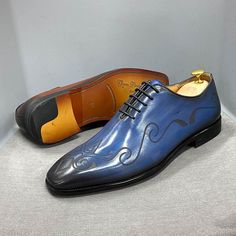 For a polished and elegant look that can be worn from work to that special event, the Classic Leather Dress Shoes are the perfect pick. Featuring a glossy leather upper with engraved detailing for a boost of style, a low block heel, and lace-up closure for a sure fit. These men's dress shoes are a must for your collection! Durable design Closure: Lace-up Comfortable to wear Material: Leather, rubber Gentleman Office, Blue Dress Shoes, British Gentleman, Men's Wedding Shoes, Basic Shoes, Brown Dress Shoes, Leather Dress Shoes, Shoes Brown, Mens Oxfords