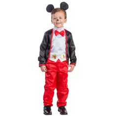 a little boy dressed in mickey mouse costume