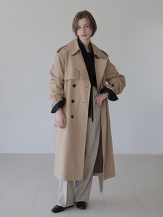 This timeless trench has traditional details like a tie waist, tabbed cuffs.It is easy-going and fresh. - Ready for those special occasions a tailored look is needed or mix it up with your favorite everyday pieces- Knee length relaxed fit trench coat- Side pockets and double breasted - Belted coat with dense twill fabric - Button up and regular collar- Single vent and lined trench Timeless Belted Long Sleeve Outerwear, Timeless Long Sleeve Outerwear With Belted Cuffs, Classic Outerwear With Notch Lapel And Belted Cuffs, Classic Double-breasted Outerwear With Belted Cuffs, Classic Oversized Outerwear With Belted Cuffs, Classic Outerwear With Belted Cuffs, Trench Coat Reference, Popped Collar, Belted Coat