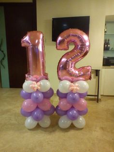 the number twenty two balloons are on display