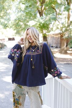 All of your boho dreams have come true with the Quinnlan Embroidered Tunic. You're going to love pairing this with all of your favorite bottoms! Lightweight Cotton gauze fabric Relaxed, loose and flowy silhouette with slight high-low bottom edge (perfect for your leggings!) Flattering round neckline and dropped shoulders and ruched center front panel Loose and long Dolman sleeves with elastic cinched cuffs So pretty floral embroidery details throughout for added boho style Pair with: Eye Of The Bohemian Embroidered Top With Boho Collar For Spring, Spring Bohemian Embroidered Top, Bohemian Embroidered Relaxed Fit Blouse, Bohemian Summer Peasant Top With Embroidered Sleeves, Bohemian Rayon Top With Floral Embroidery, Bohemian Embroidered Peasant Top For Spring, Bohemian Embroidered Peasant Top For Fall, Bohemian Rayon Tops With Floral Embroidery, Spring Bohemian Embroidered Peasant Top