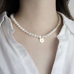 "M A T E R I A L ~ Charm: Gold vermeil 925 sterling silver ~ Pearl: 7mm AAA grade real freshwater pearls ~ Closure: Gold plated 925 sterling silver * * * * * * * * S I Z E ~ Length 14\" to 20\" (+2\"extension) ~ Pearl about 7-8mm * Natural freshwater pearls will vary in size and shape. * * * * * * * * C A R E ~ Wipe clean ~ Please avoid contact with water, sweat, perfume, cream, oil, and so on. * * * * * * * * G I F T S ~ You can gift the jewelry straight to your loved one for free. ~ For multiple items, we will package them together in the same box. If you need separate boxes, please leave us a note at checkout :) * * * * * * * * I N S T A G R A M @bloomingbeige * * * * * * * * If you can't find the information you need, please feel free to ask at any time of the day. Thank you so much fo Letter Charms, Freshwater Pearl Necklaces, Charm Gift, Initial Charm, Silver Pearls, Chain Styles, How To Make Beads, Gold Vermeil, Fresh Water