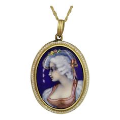 A lovely example of Victorian design. These pendant features a hand painting of a dignified woman with a flower hat. It is full of detail and life. It is accented by a hand made braided gold frame and natural seed pearls which halo the piece. Made in 14k yellow gold.  Pendant Length: 1.1 inches Elegant Hand Painted Gold Necklaces, Elegant Hand-painted Gold Necklaces, Elegant Hand Painted Necklaces, Victorian Pearl Pendant Jewelry Gift, Elegant Hand Painted Pendant Necklaces, Victorian Gold Jewelry With Pearl Charm, Victorian Yellow Gold Pendant Locket Necklace, Victorian Yellow Gold Necklace With Pearl Pendant, Victorian Enamel Yellow Gold Necklace