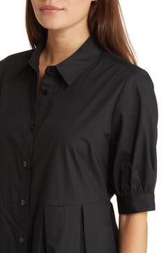 This polished shirtdress is crafted from crisp cotton with shaping inverted pleats and elbow-length sleeves. Spread collar Elbow-length sleeves 100% cotton Hand wash, line dry Imported Cotton Shirt Dress With 3/4 Sleeves For Work, Classic Pleated Short Sleeve Shirt Dress, Classic Pleated Shirt Dress With Short Sleeves, Long Sleeve Cotton Pleated Shirt Dress, Half Sleeve Cotton Shirt Dress For Work, Fitted Short Sleeve Shirt Dress With Pleated Waist, Office Shirt Dress With Pleated Sleeves, Short Sleeve Shirt Dress With Pleated Waist, Short Sleeve Shirt Dress With Pleated Waist For Daywear