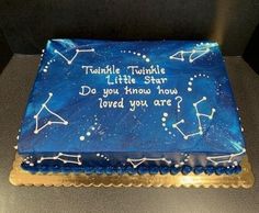 a blue cake with stars and zodiac signs on it that says twinkle, twinkle little star do you know how loved you are?