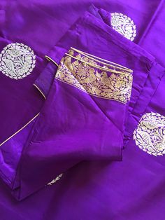 This is a beautiful handloom katan silk light weight banarasi in deep purple/ egg plant shade with beautiful sona rupa bird motifs in body and floral and bird motifs in gold zari in pallu, all in kadua weave. Saree comes with a stitched blouse in standard size 36-38. Saree is finished with tassels and falls and pico are done.  *colour may vary slightly due to lighting and individual device settings. *Falls and Pico- Yes * Tassels-Yes *Blouse-yes, standard size 36 with margin for size 38 * All sales are final * Dry clean only * Handloom products may have some irregularities Purple Art Silk Kurta With Zari Work, Purple Raw Silk Kurta With Traditional Drape, Traditional Purple Chanderi Kurta, Purple Banarasi Silk Sets With Zari Work, Purple Silk Traditional Wear With Cutdana, Purple Banarasi Silk Set For Eid, Purple Art Silk Kurta For Festivals, Purple Kurta With Traditional Drape For Festivals, Traditional Purple Kurta