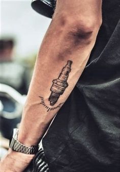 a man with a tattoo on his arm