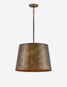 a light fixture hanging from the ceiling with a brown shade on it's side