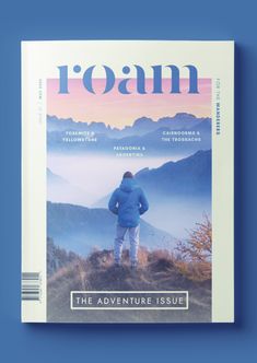 the front cover of roam magazine, featuring a man standing on top of a hill