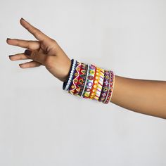 Bohemian Beaded Bracelets For Puja, Bohemian Multicolor Beaded Bracelets For Festivals, Multicolor Bohemian Beaded Bracelets For Festivals, Traditional Multicolor Festival Bracelets, Traditional Multicolor Bracelets For Festivals, Bohemian Bracelets For Diwali Puja, Bohemian Handmade Bangle For Navratri, Bohemian Bracelets For Puja And Diwali, Traditional Multicolor Beaded Bangle Bracelets