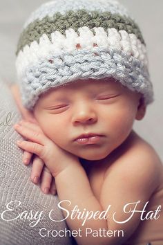 a newborn baby wearing a crocheted hat