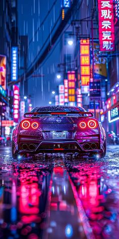 a car driving down a city street in the rain with neon lights on it's buildings