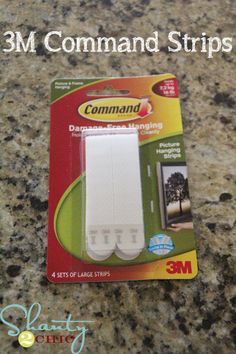 3m command strip for refrigerators and cabinets in white packaging on granite counter top