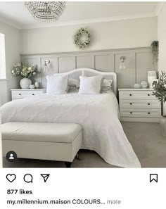 a white bedroom with lots of furniture and decor