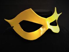 DESCRIPTIONSpeed around town in a yellow mask for supervillian Professor Zoom, Reverse Flash! Great for Halloween or Marvel Firestar at Comicon. **We also sell this mask with a red lightning bolt!** Or, perhaps you need a plain yellow mask for Masquerade Ball. Get this style in any color. Waterproofed leather, glossy or matte finish, & several choices to affix the mask (cord, elastic, ribbon, waterproof cord, stick, or no holes for adhesive). Measurements: 3.25" high x 10.5" wide (tallest &a Yellow Halloween Cosplay Costume Accessories, Superhero Style Masquerade Masks For Halloween, Yellow Costume Accessories For Halloween Cosplay, Superhero Masks For Halloween Masquerade, Superhero Masquerade Mask, Mask For Masquerade Ball, The Reverse Flash, Professor Zoom, Mask For Masquerade