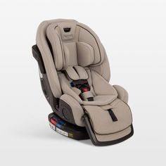 the child's car seat is shown in beige