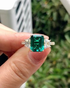 ------------------------------------------------------------------------------ ❤ Product Information ❤ ------------------------------------------------------------------------------ Brilliant 3.55CT Lab Created Emerald Center Engagement Ring,Minimalist Style Anniversary Ring,Promise Ring For Female,14K Yellow Gold Ring ✥ 𝐌𝐚𝐢𝐧 𝐒𝐭𝐨𝐧𝐞 𝐃𝐞𝐭𝐚𝐢𝐥𝐬 ↣ Shape:  Emerald Cut ↣ Type: Genstone ↣ Weight: 3.55 Carat (App.) ↣ Dimension: 8x11 MM (App.)  ↣ Color: Colorless ↣ Clarity: AAAA+ ↣ Making Process: Handmade - Crafted by our experienced team ✥ 𝐒𝐢𝐝𝐞 𝐒𝐭𝐨𝐧𝐞 𝐃𝐞𝐭𝐚𝐢𝐥𝐬 ↣ Shape: Trapezoid Shape ↣ Type: Moissanite ↣ Weight: 0.80 Carat (App.) ↣ Color/: Colorless/ VVS-VS ↣ Options: Lab Grown Diamond and Natural Diamond (Possible on request while placing an order and Extra Chargeabl Emerald Engagement Ring Rectangle, Emerald Stone Engagement Ring, Emerald Engagement Ring Green, Engagement Ring Minimalist, May Birthstone Rings, Emerald Wedding Rings, Emerald Rings, Green Emerald Ring, Minimalist Engagement Ring