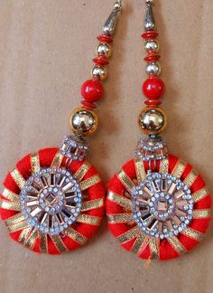 Designer's Den Tassels For Women wedding Handmade Hanging bridal heavy Tassels Lehange Fancy Beautiful Pair of Latkans & Brooch Accessory For You Decorative Products. In Indian These Latkans Are Normally Used as The Accessory For Lengha & Sari Blouse On The Back, But These Can Be Used in Many Other Ways to Metal & Pearl scan be used at an door. Muzaffarpur is a State in India for these kind of Art works Ethnic, Casual and Party Wear Designs Lahenga party latkan beauty ,colors & fabrics Created w Party Wear Designs, Latkan For Blouse, Lengha Sari, Lehenga Indian, Hanging Craft, Handmade Hanging, Sari Blouse, Color Set, Silk Fabric