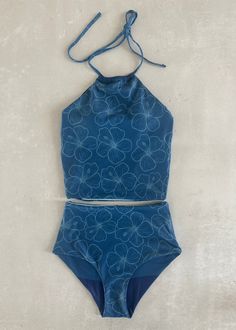 This darling reversible tankini is basically four swimsuits in one because both the top and bottom are fully reversible! The top has an added layer inside with sewn-in padding for worry-free play all day. We tested the fabrics in the salty ocean, sandy beaches, pools, and hot-tubs. It is high-quality, comfortable, and SO much fun!! Truly, a combination you won't want to live (or swim) without ;). High-waisted reversible bottoms High neck reversible top Sewn-in padding High quality fabric Full Co Surfing Bathing Suits Women, One Price Swimsuit, Swimsuit Id Codes, Cute Beach Clothes, Cute Swimsuits For Teenagers, Cottagecore Swimsuit, Beach Vacation Must Haves, Modest Swimming Suits, Cute Swimming Suits