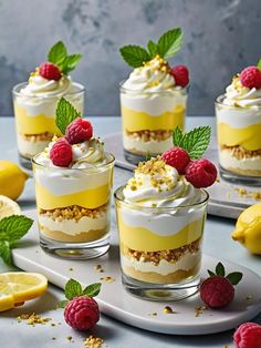 small desserts with raspberries and lemon on the side are ready to be eaten