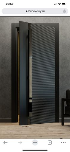 an open black door in the middle of a room