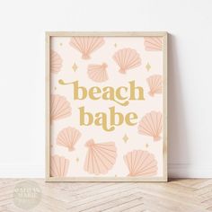 a pink and gold print with the words beach babe on it