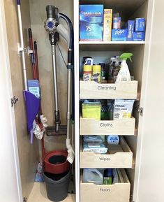 the closet is filled with cleaning supplies and other items