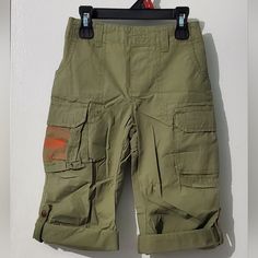 Brand New, Cherokee Toddler Green Roll Tab Hem Cargo Pants. It Has Elastic Waist And Multiple Pockets. No Flaws, Please Review Pictures Closely For Details. Size 3 Green Shorts With Pockets For Playwear, Casual Outdoor Cotton Capris, Casual Green Playwear Bottoms, Casual Cotton Capris For Outdoor, Casual Green Bottoms For Playwear, Green Bottoms With Pockets For Playwear, Green Cotton Playwear Pants, Spring Playwear Bottoms With Pockets, Kids Bottoms