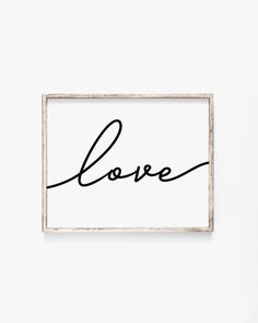 a black and white photo with the word love written in cursive writing on it